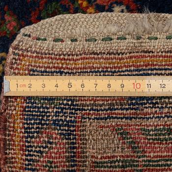 A semi-antique Northwest Persian runner, c. 388 x 94 cm.