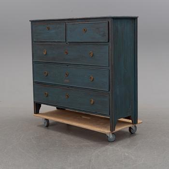 a chest of drawers from the 19th century.