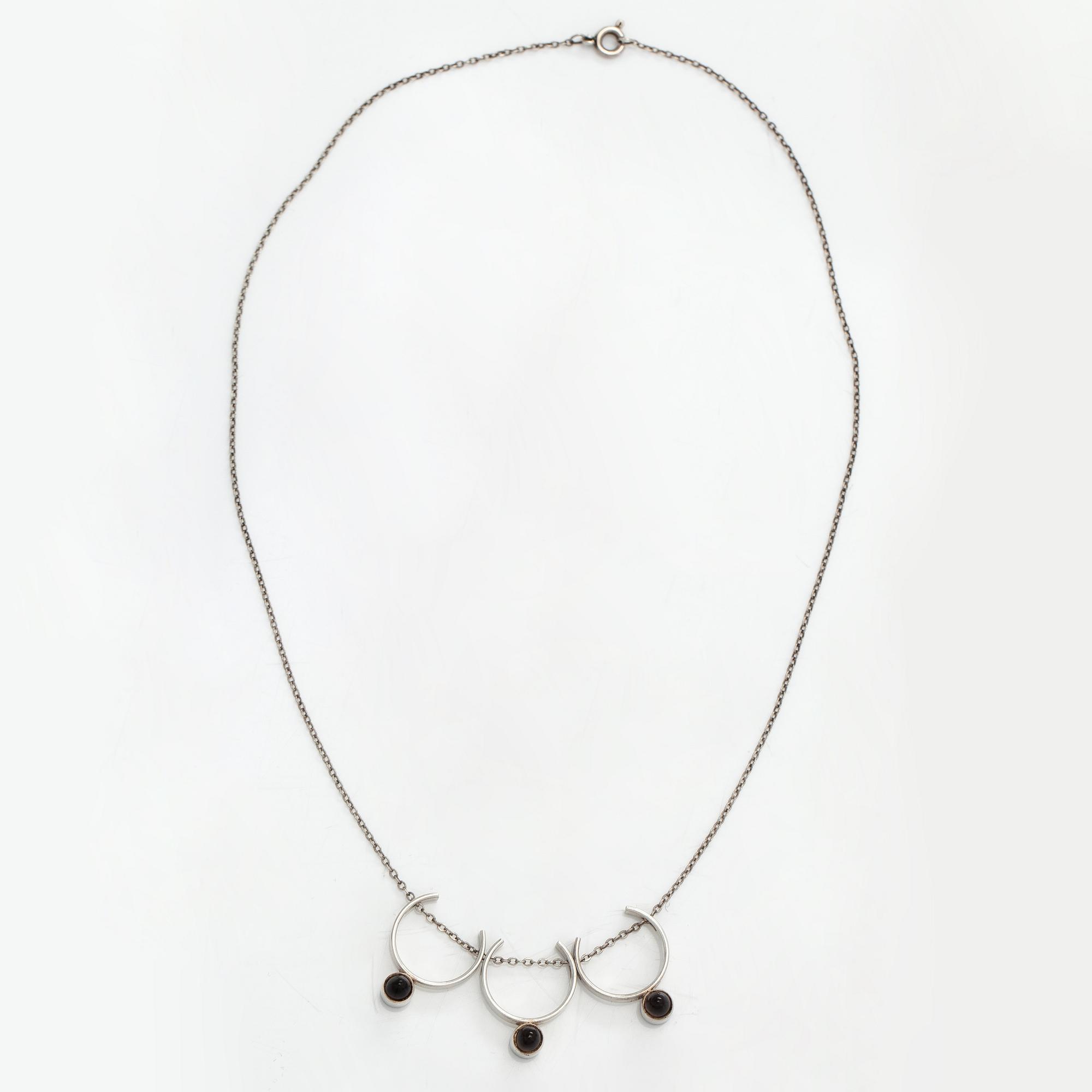 Elis Kauppi, A silver and smoky quartz necklace. Kupittaan kulta, Turku 1961.