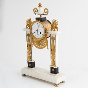 A French Louis XVI ormolu and marble portico clock, late 18th century.