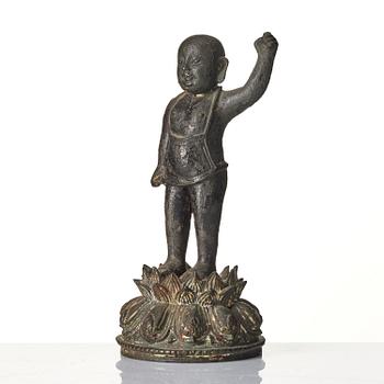 A bronze sculpture of buddha as a child, Ming dynasty (1368-1644).