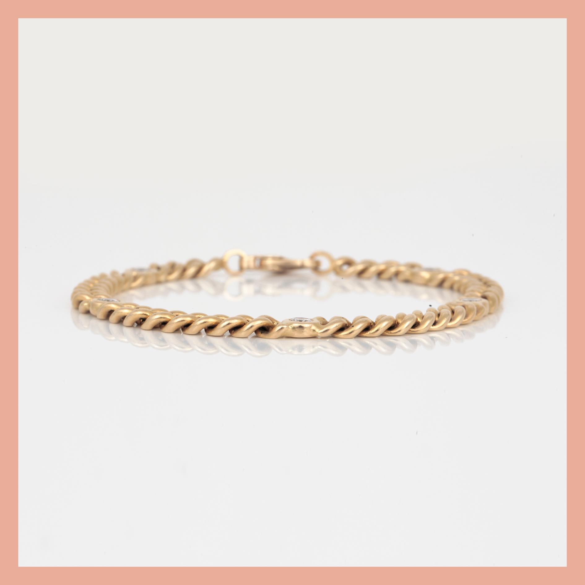 ARMBAND, kedja med 5 st briljantslipade diamanter, ca 0.80 ct totalt.