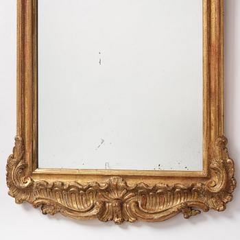 A Swedish rococo giltwood mirror, Stockholm later part 18th century.