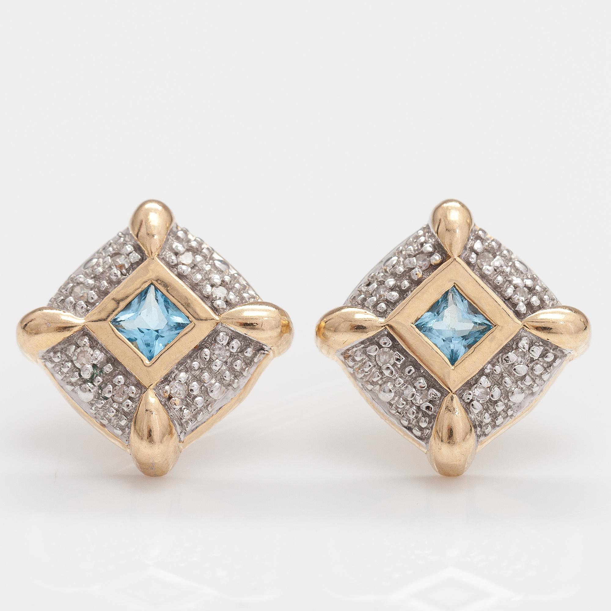 A set of 14K gold earrings and pendant with topazes and diamonds ca. 0.04 ct.