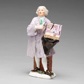 A Meissen porcelain figure of a trinket salesman from the series of Parisian street-traders, circa 1745.