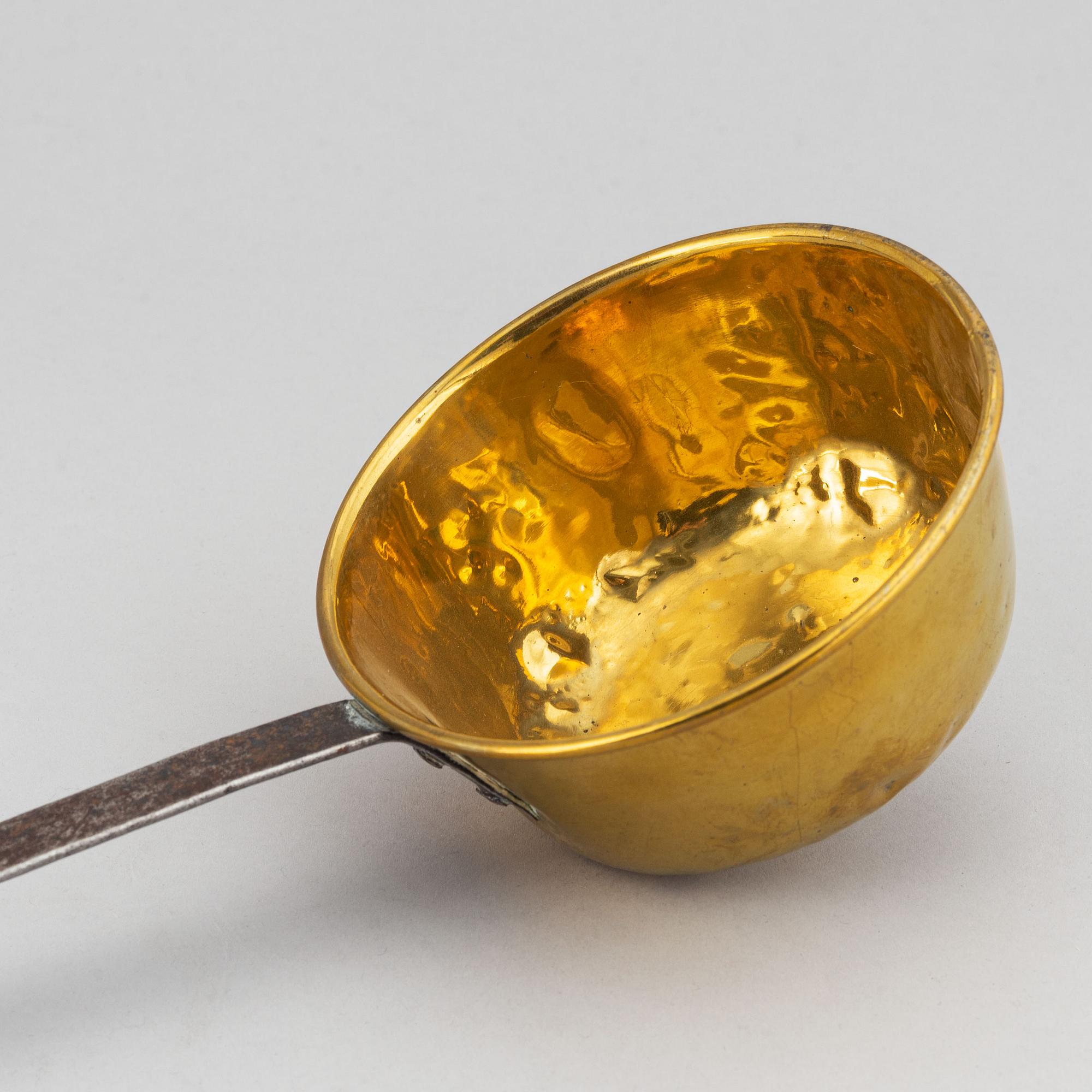 A ladle and sieve, brass, 18th century.