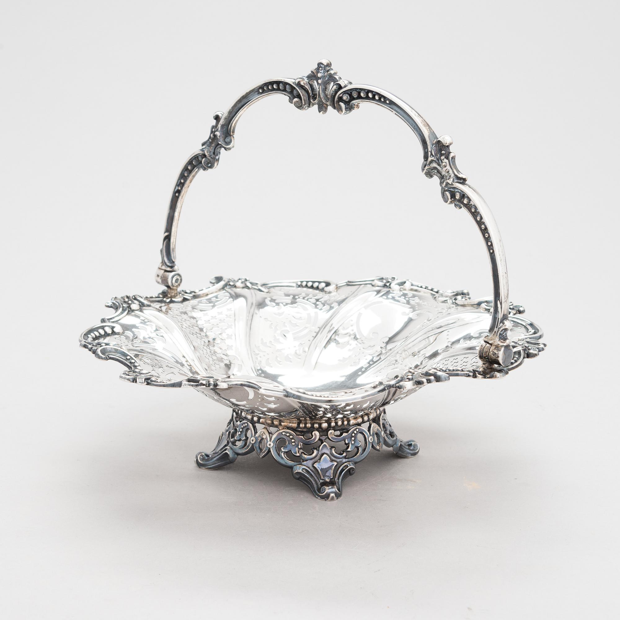 A Victorian sterling silver sweetmeat basket, maker's mark of Henry Wilkinson & Co, Sheffield 1855.