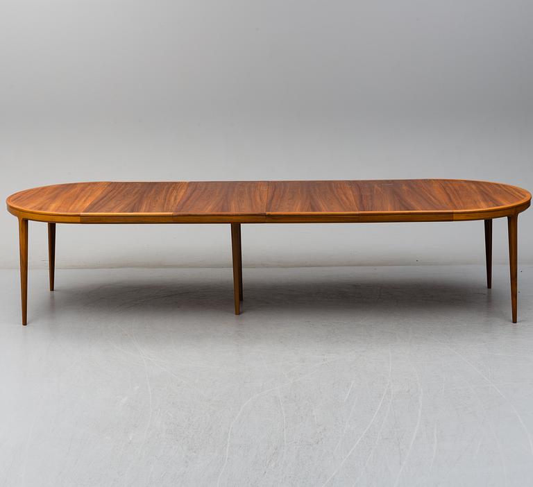 BERTIL FRIDHAGEN, A walnut veneered dining table from Bodafors, 1963.