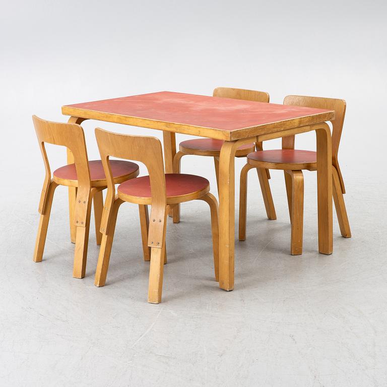 Alvar Aalto, a set of four model N65 children's chairs with table, Artek, Finland.