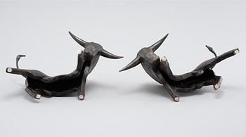 LARS LARSSON, a pair of cast iron sculptures, signed.