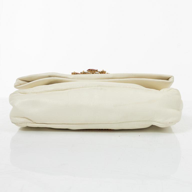 Miu Miu, a handbag/clutch.