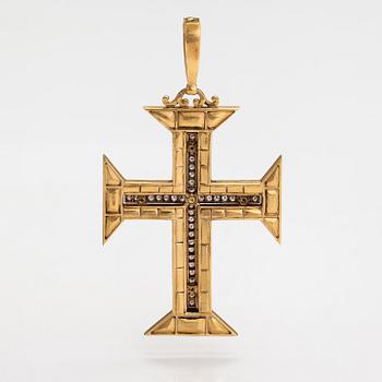 An Order of Christ Portugal cross made of 18K gold with diamonds ca. 1.00 ct in total and garnets.