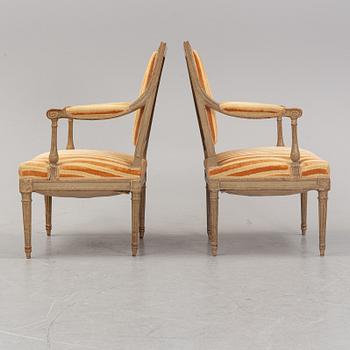 Karmstolar, ett par, Directoire-stil, omkring år 1900.