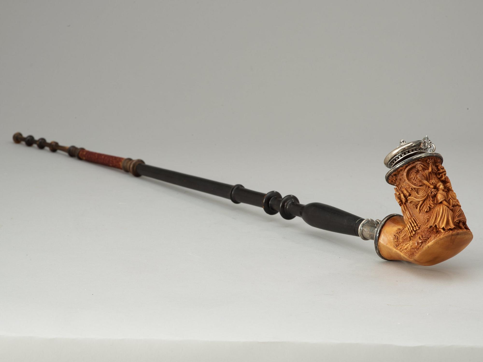 A Swedish birch carved pipe bowl by S.Isberg (not signed) dated 1856.