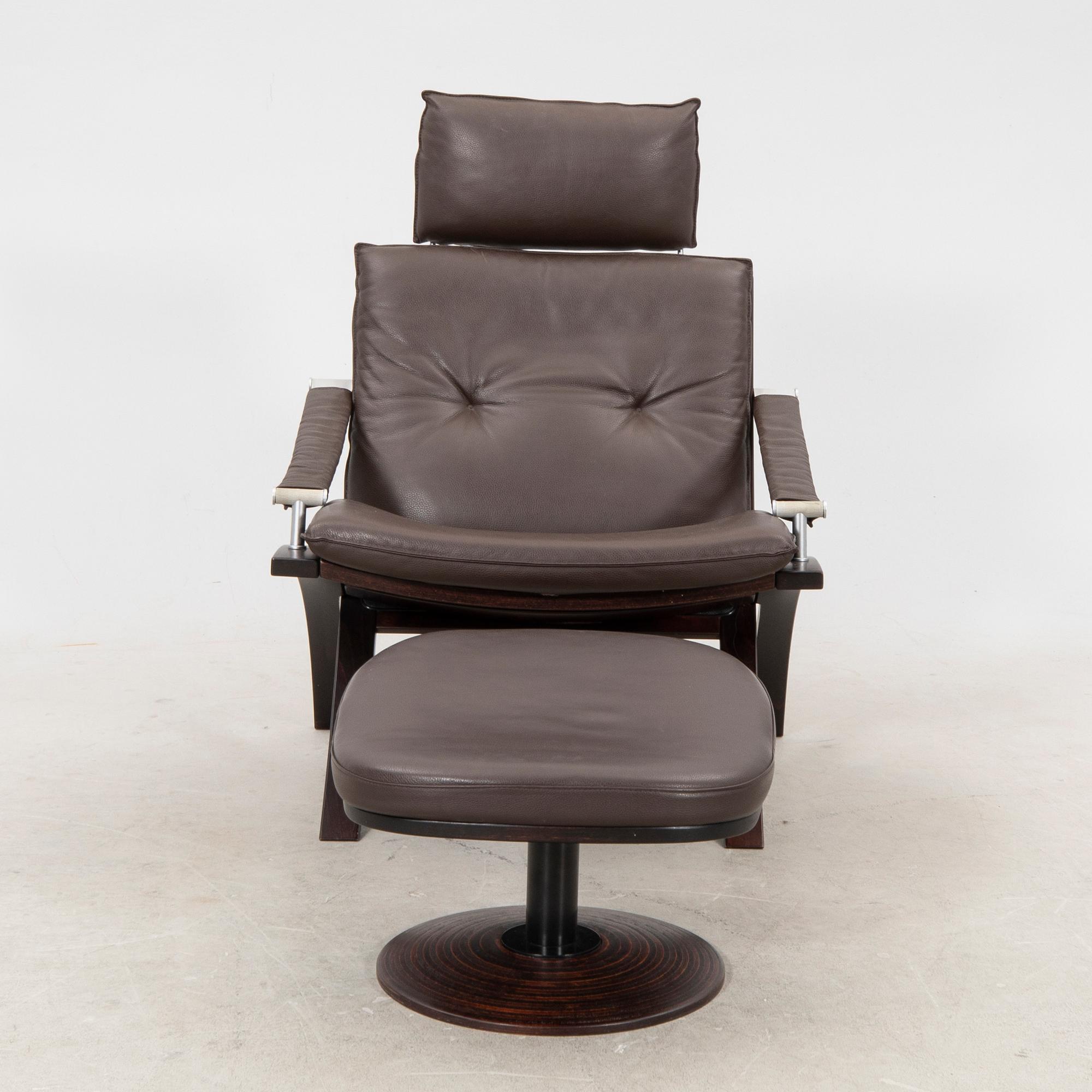 Åke Fribyter, an armchair and fotstool by Nelo, Knislinge, second half of the 20th Century.