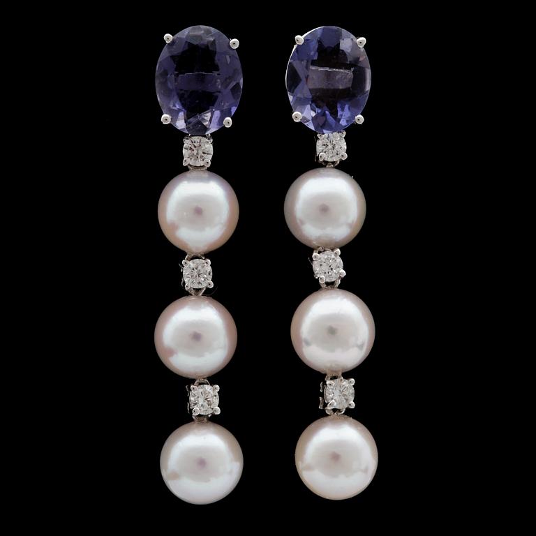 A pair of culture pearl, iolites and brilliant cut diamond earrings, tot. app. 0.50 cts.