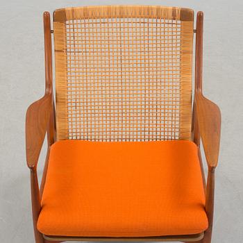 S A ANDERSEN, ERIK ANDERSEN & PALLE PEDERSEN, a teak and rattan easy chair from Horsnaes, Horsens, Denmark, 1960's.