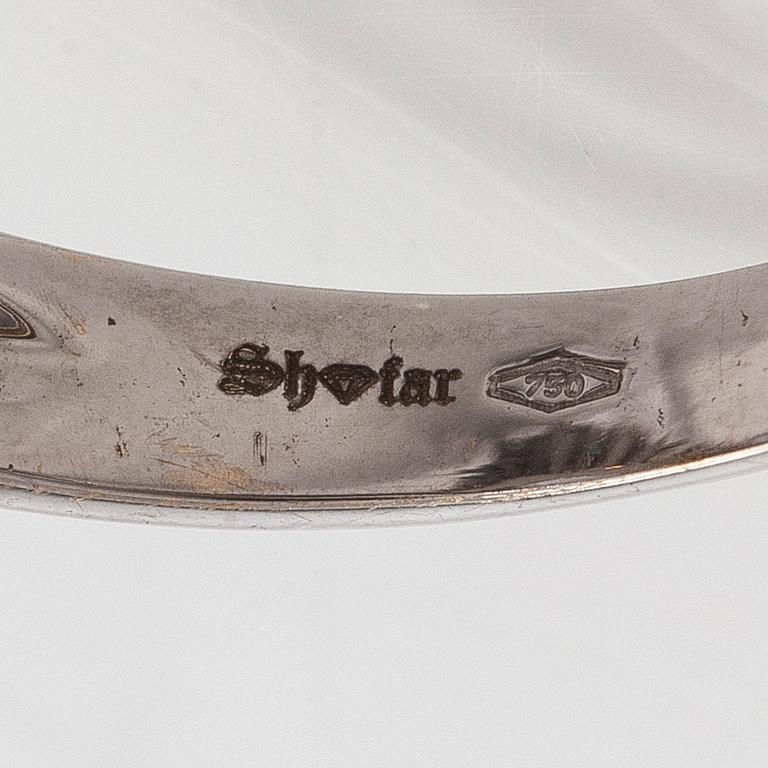 Sormus, viistehiottu akvamariini, briljanttihiotut timantit, 18K valkokultaa.