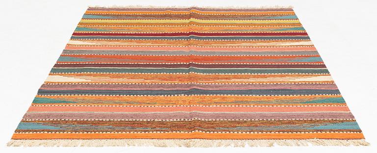 A Persian Kilim rug, c. 247 x 180 cm.
