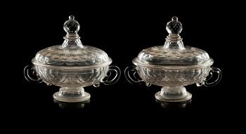 631. A pair of cut glas butter tureens with cover, 18th Century.