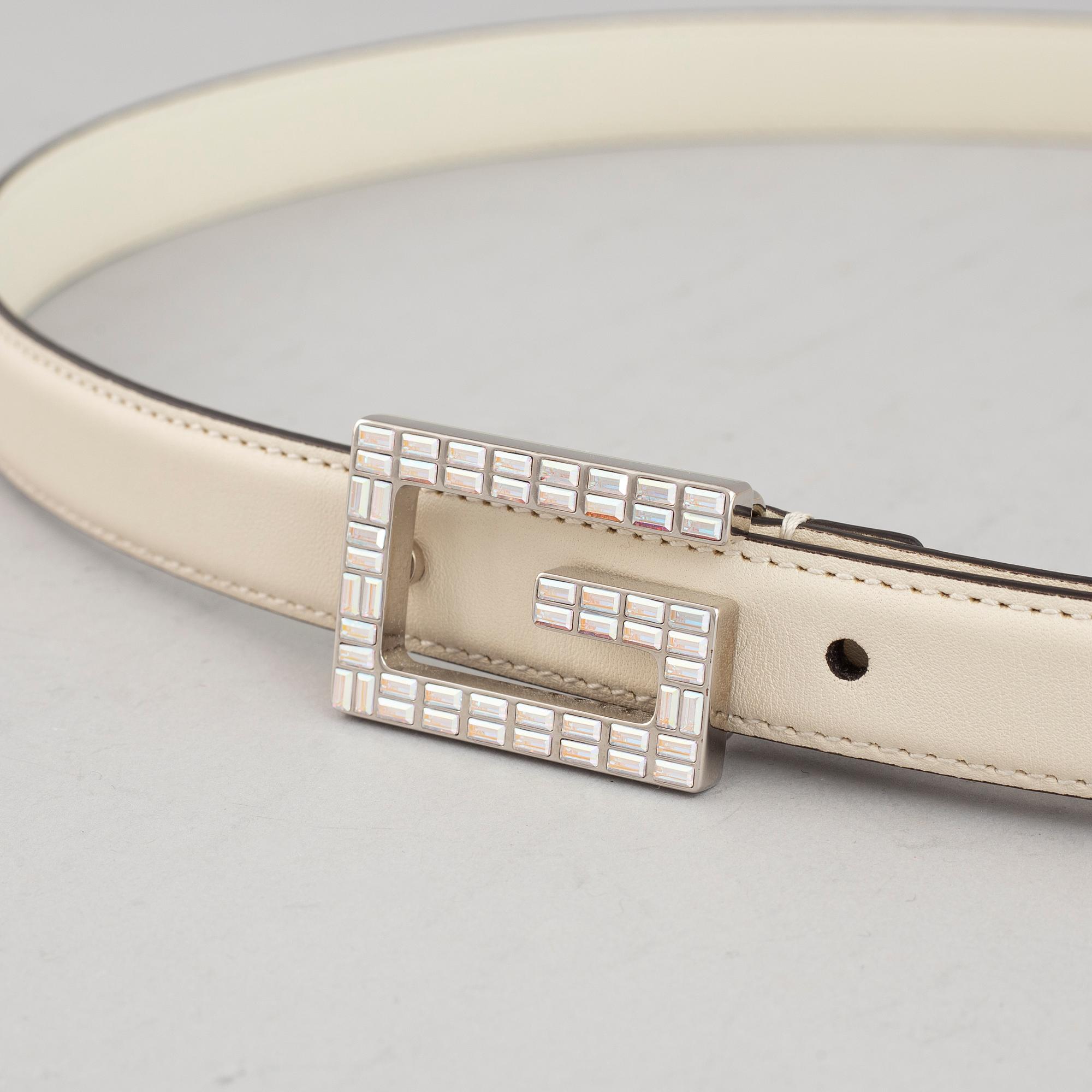 Gucci, a white leather belt, size 90 36.
