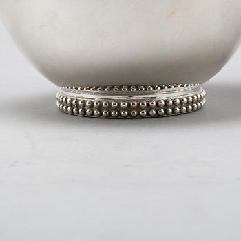 A silver coffee set of four pieces from the middle of the 20th century.