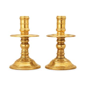 522. A pair of presumably Dutch colonial candlesticks.