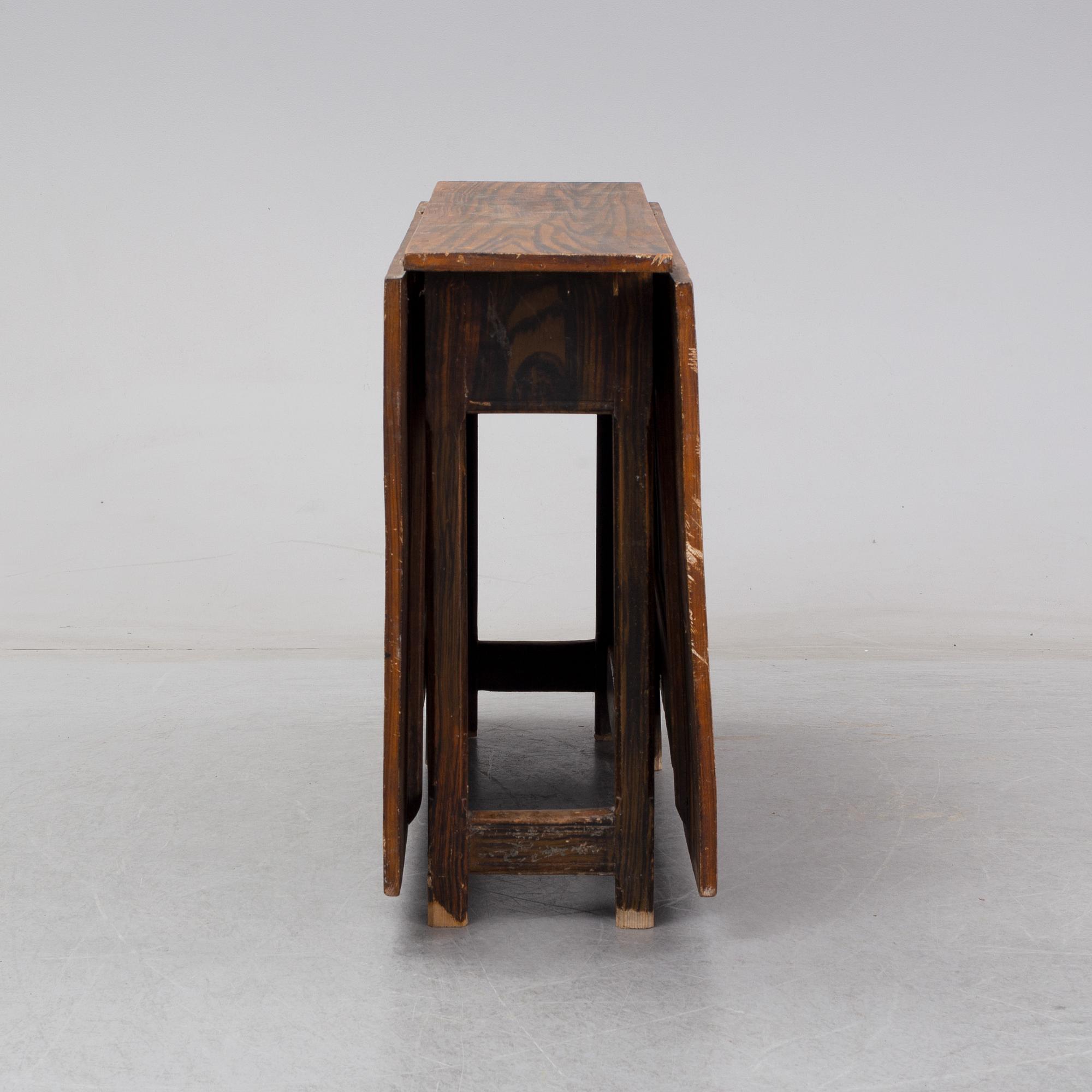 A 19th Century painted gate leg table.