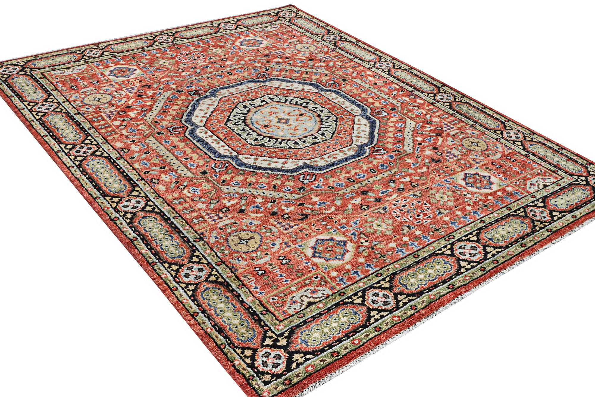 A carpet of Mamluk design, c. 307 x 243 cm.