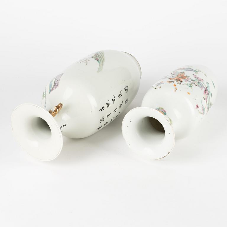 A set of two Chinese famille rose vases and two cups with covers and stands, late Qing dynasty/early 20th Century.