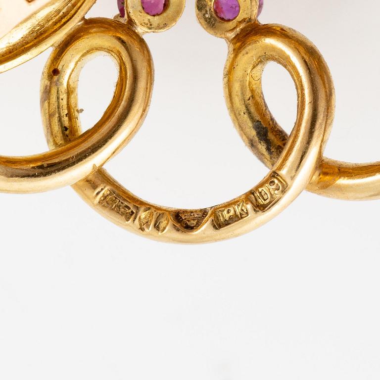 A Strömdahls bracelet/pendant combination in 18K gold with rubies, emeralds, pearls and diamonds.