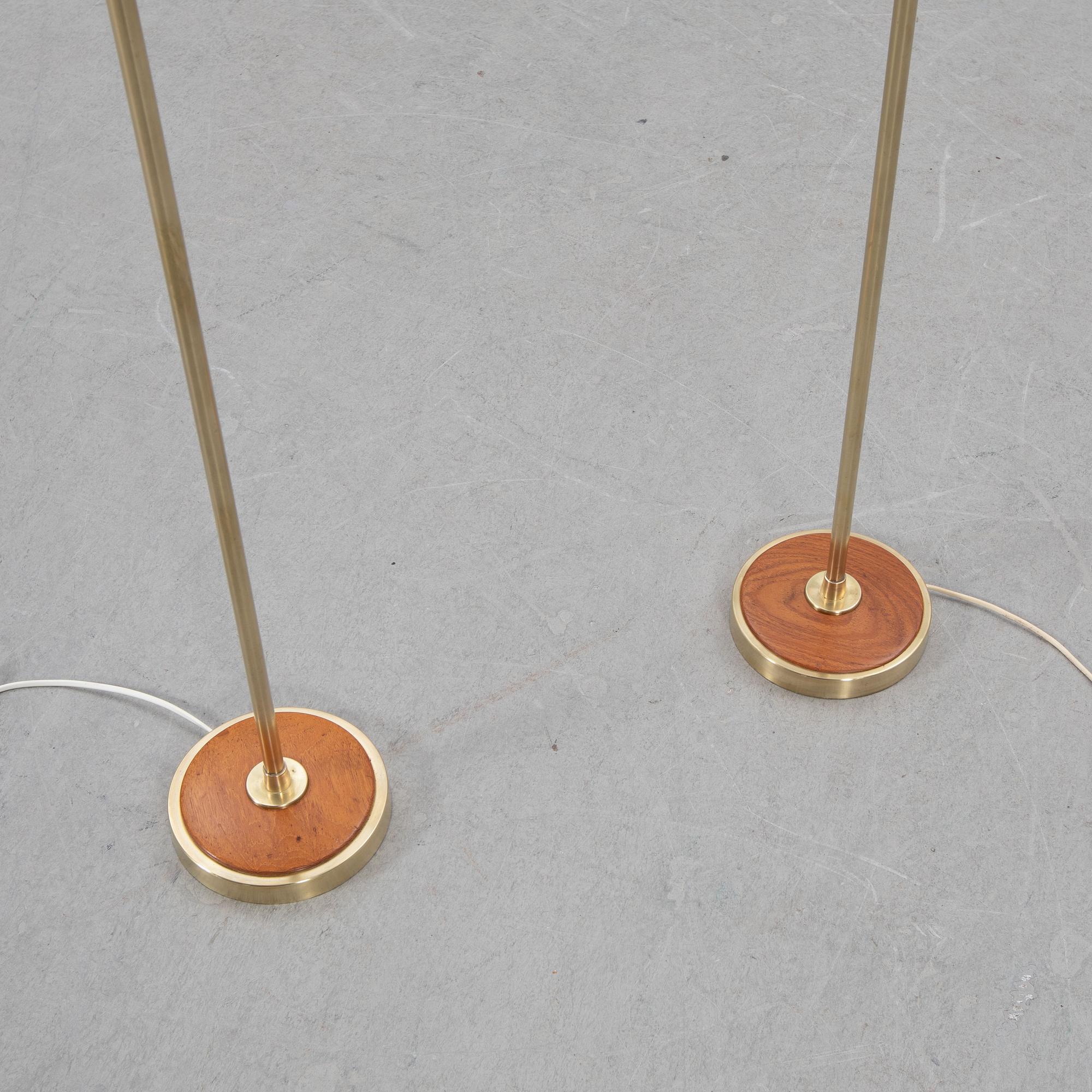 Floor lamps, a pair, mid-20th century.