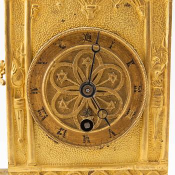 Neo-Gothic table clock, signed and dated in the work 1838.