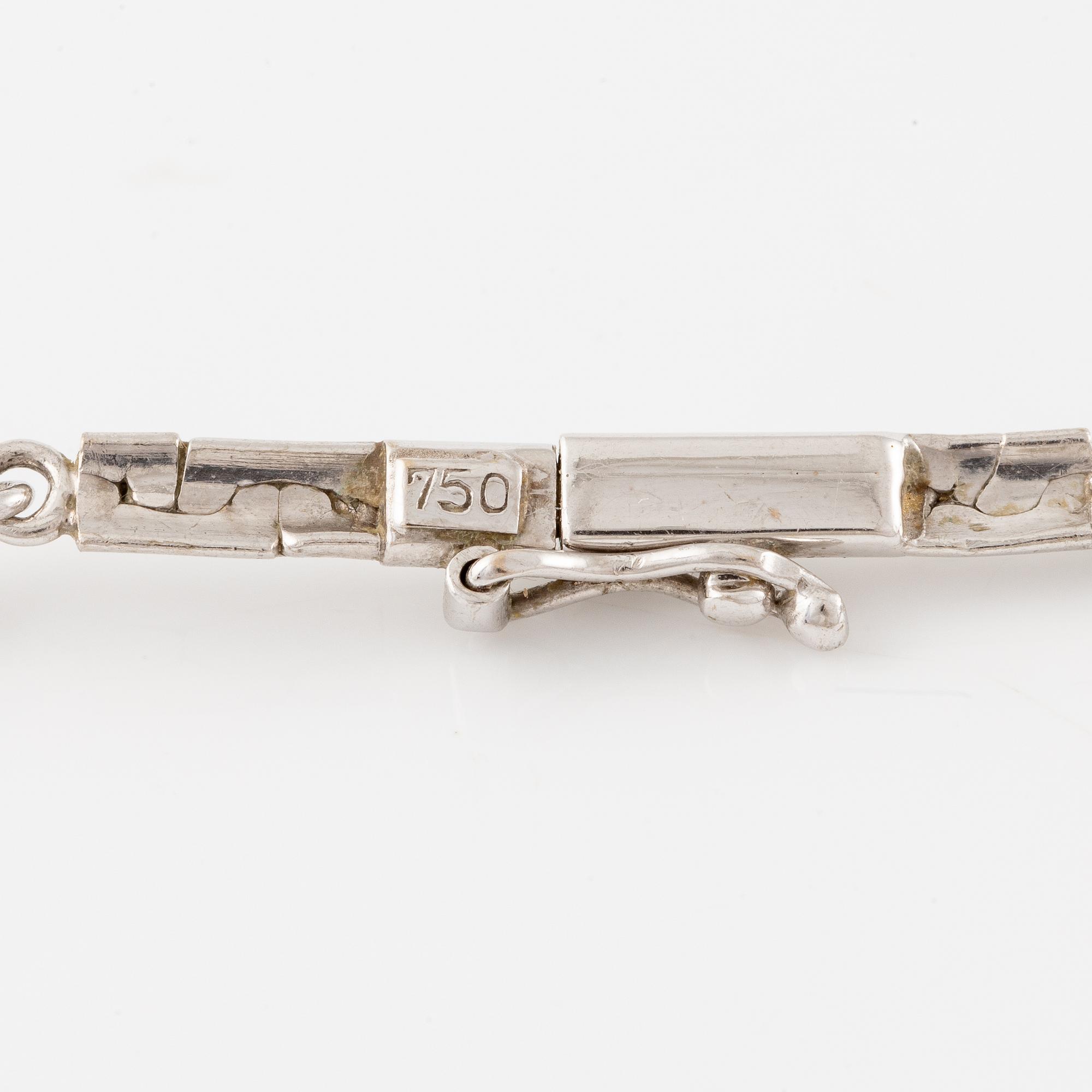 Necklace, 18K white gold with turquoises and baguette-, octagonal- and brilliant-cut diamonds.