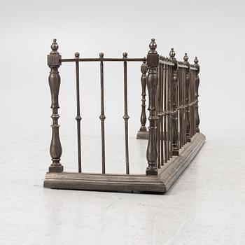 An English brass fire gate, circa 1800.