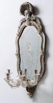 A pair of Venetian four-light girandole mirrors attributed to Briati family, circa 1730.