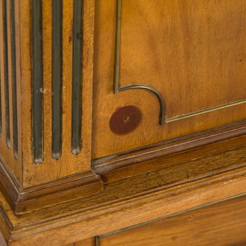 A 20th-century Louis XVI style mahogany veneered writing desk.