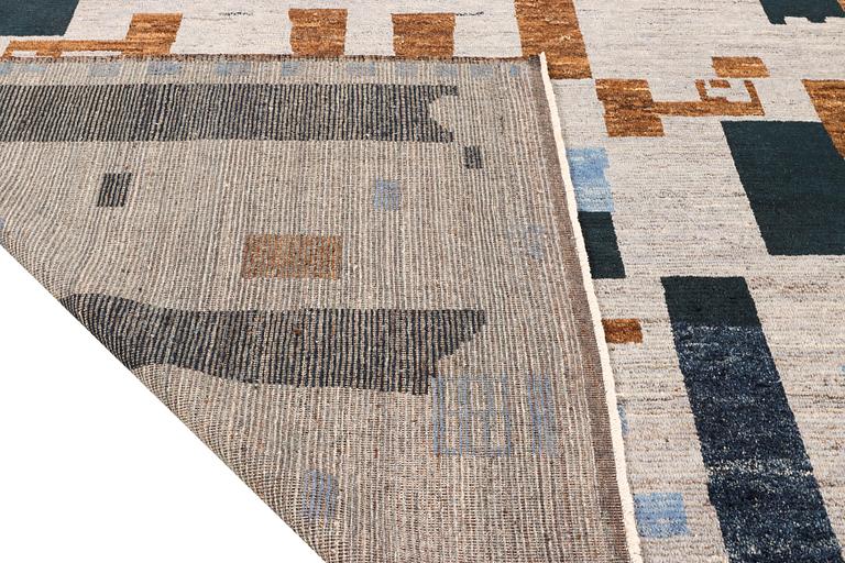 A Morocco carpet, c. 372 x 281 cm.