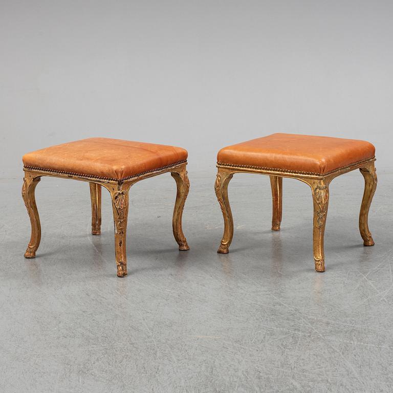 A pair of giltwood Louis XV 18th century stools.