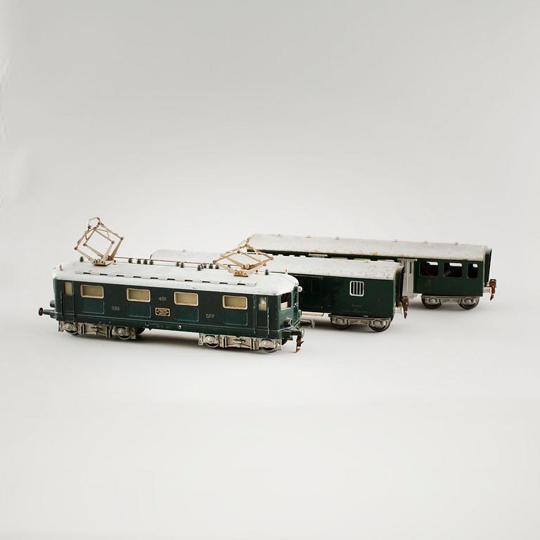 A 1940/50s model train set of 31 pcs in O-scale made by HAG, Switzerland.