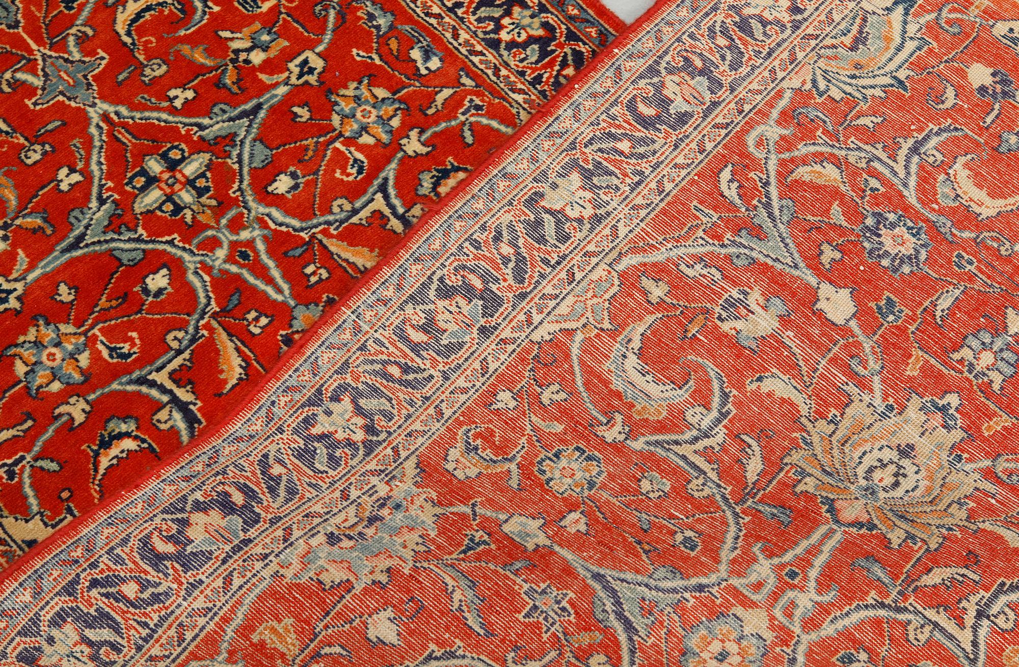 A Sarouk runner, 410 x 80 cm.