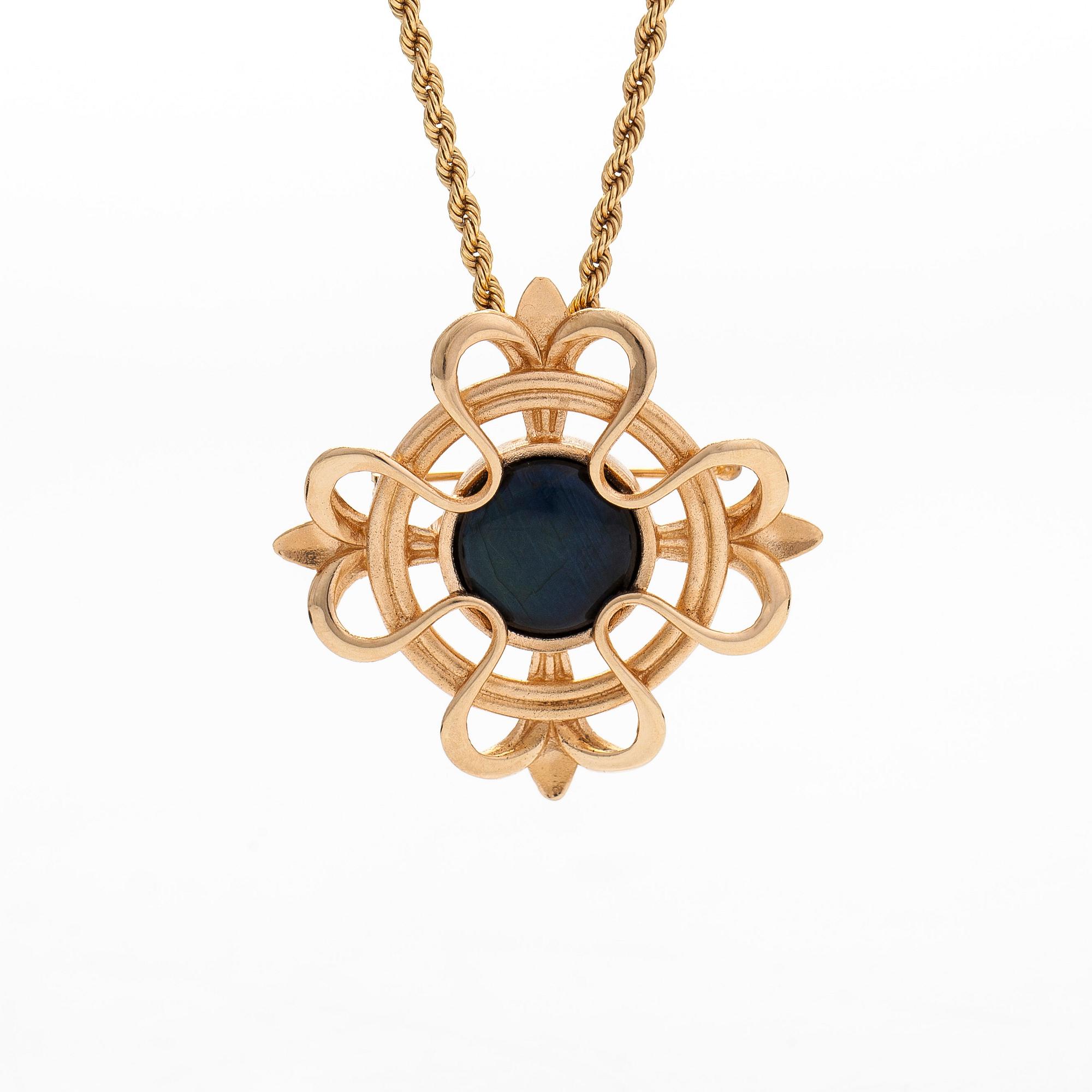 Kalevala Koru, a pendant/brooch with chain, "Lily", 14K gold and spectrolite. Helsinki 2002.