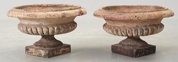 A pair of English 19th century stoneware garden urns.