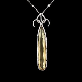 41. A necklace with yellow beryl, 12.87 cts set with brilliant-cut diamonds, 1.30 cts in total.