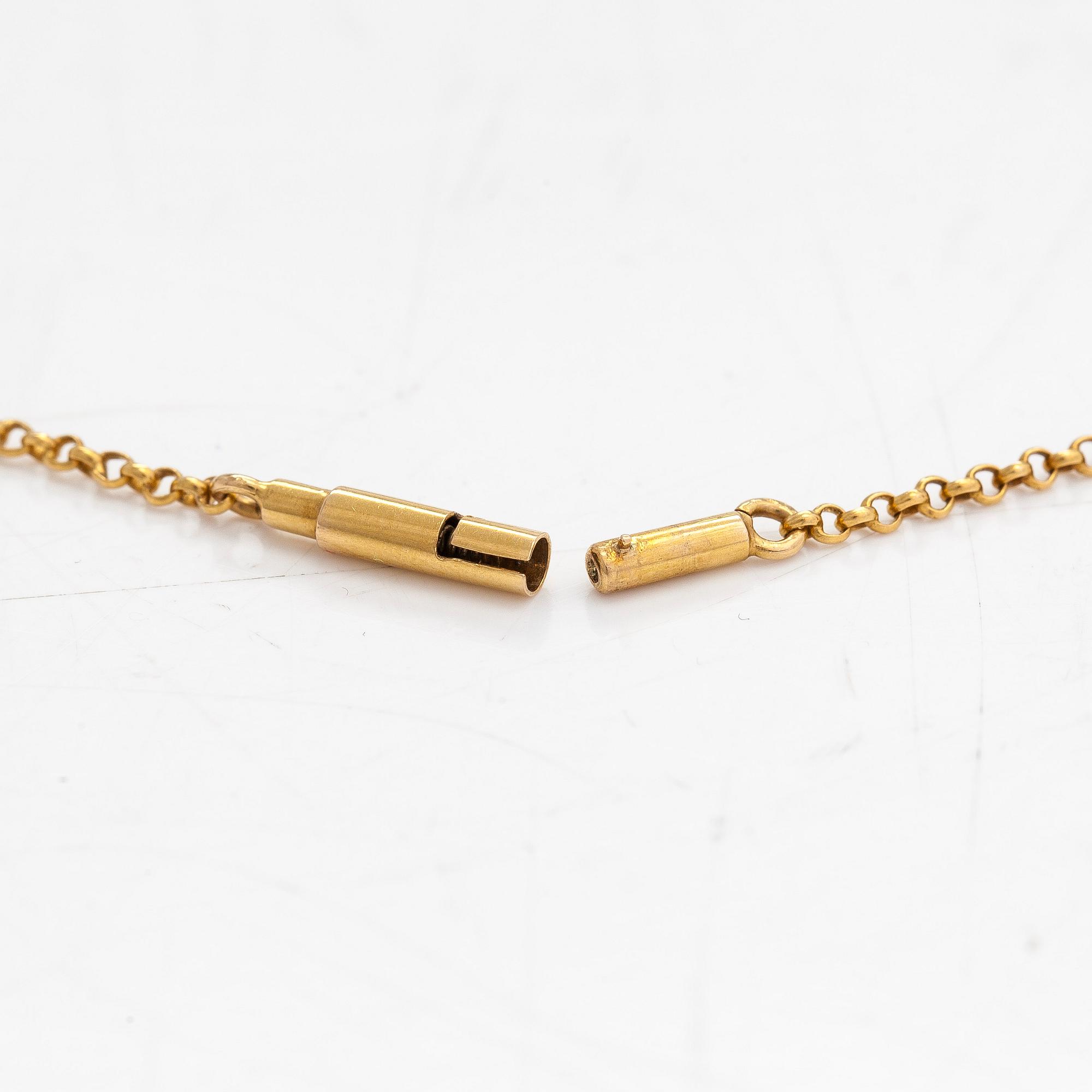 An 18K gold filigree necklace with seed pearls and a citrine, Stockholm 1910.