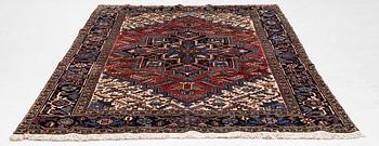 A Heris carpet, approx. 275 x 200 cm.