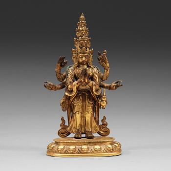 381. AVALOKITESHVARA, förgylld kopparlegering. Tibet, circa 1800.