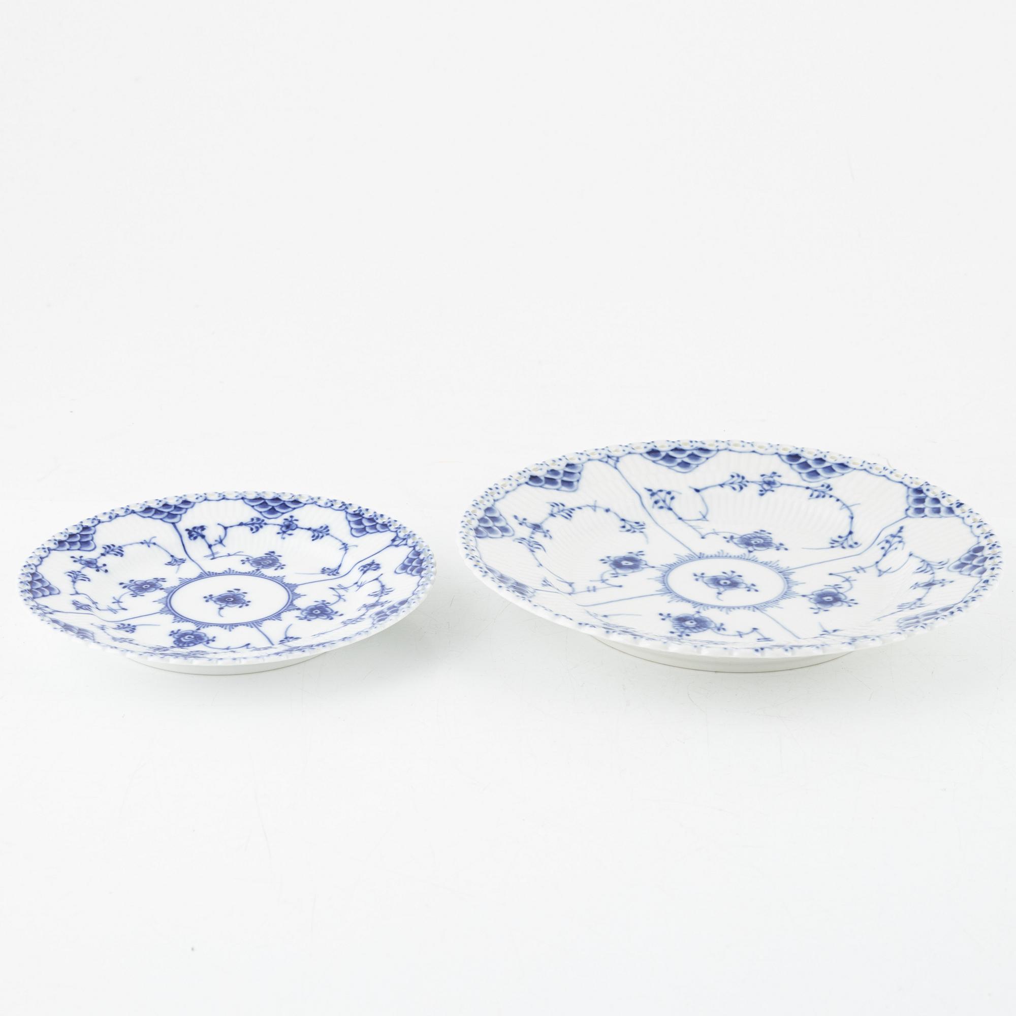 Royal Copenhagen, 76 porcelain service parts, 'Musselmalet Full Lace and Half Lace', Denmark.