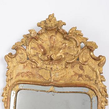 A rococo mirror, second part of the 18th Century.