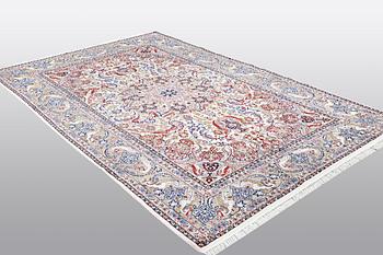 A carpet, Old Esfahan, part silk, ca 308 x 202 cm.